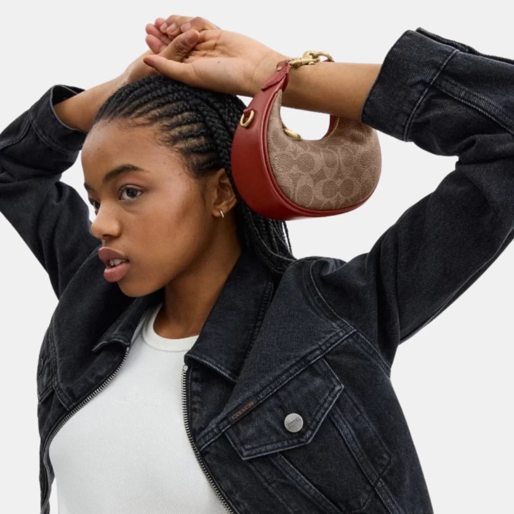 Coach Jonie Mini Leather Bag In Signature Canvas - DIVA ONLINE STORE