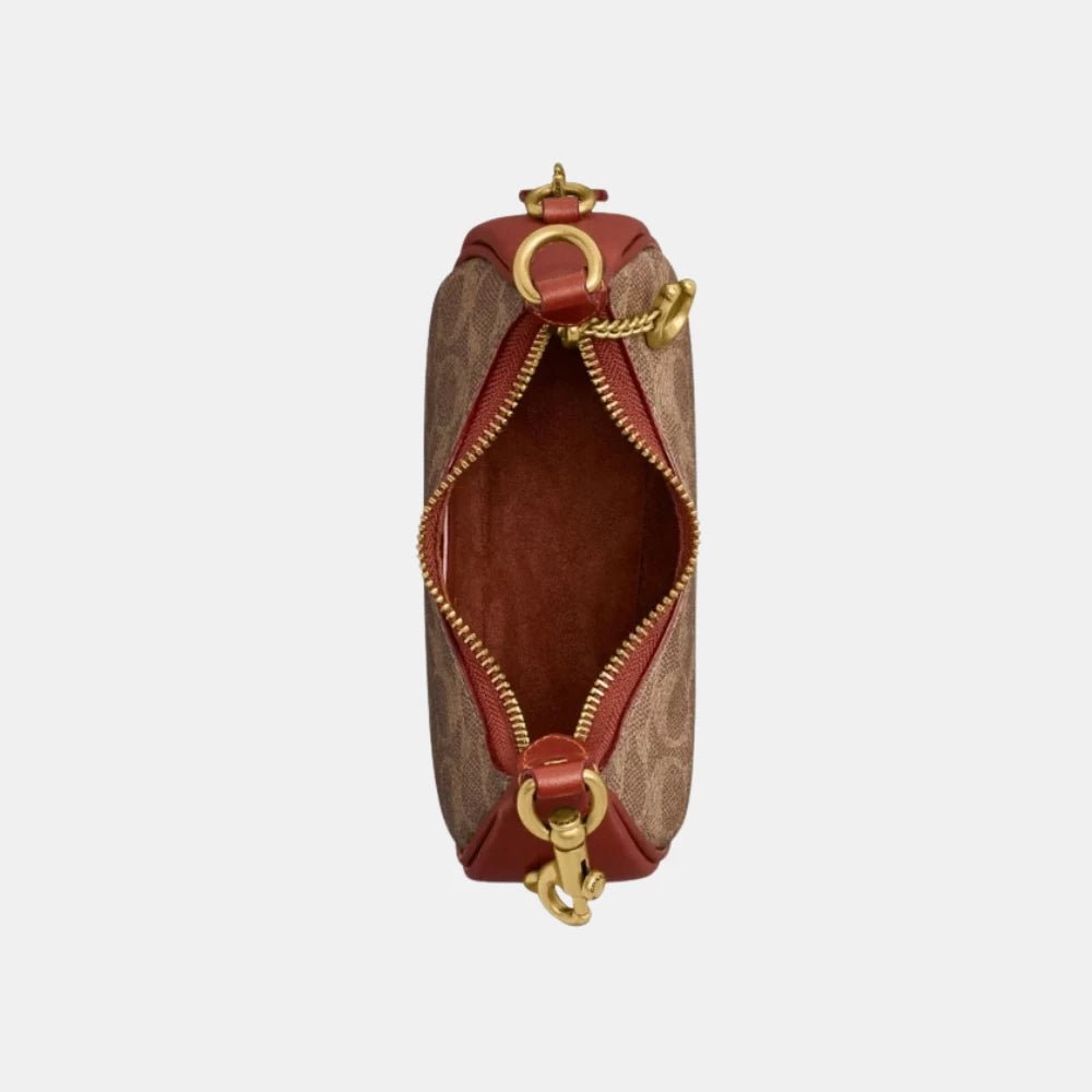Coach Jonie Mini Leather Bag In Signature Canvas - DIVA ONLINE STORE