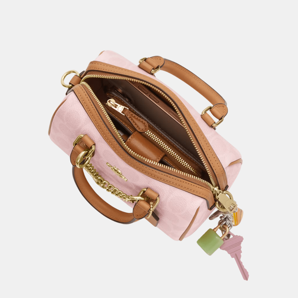 Coach Mini Rowan Crossbody Bag In Signature Canvas With Charms - DIVA ONLINE STORE