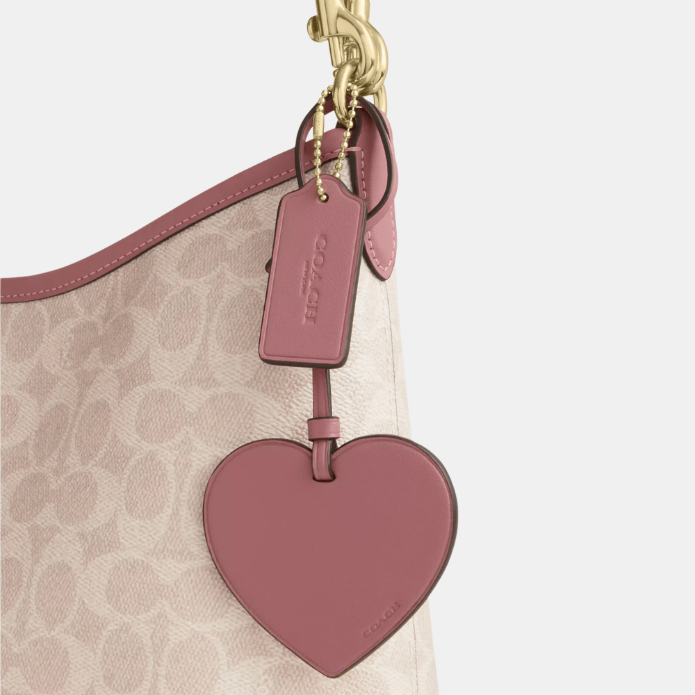Coach Laurel Shoulder Bag In Signature Canvas With Heart Charm - DIVA ONLINE STORE