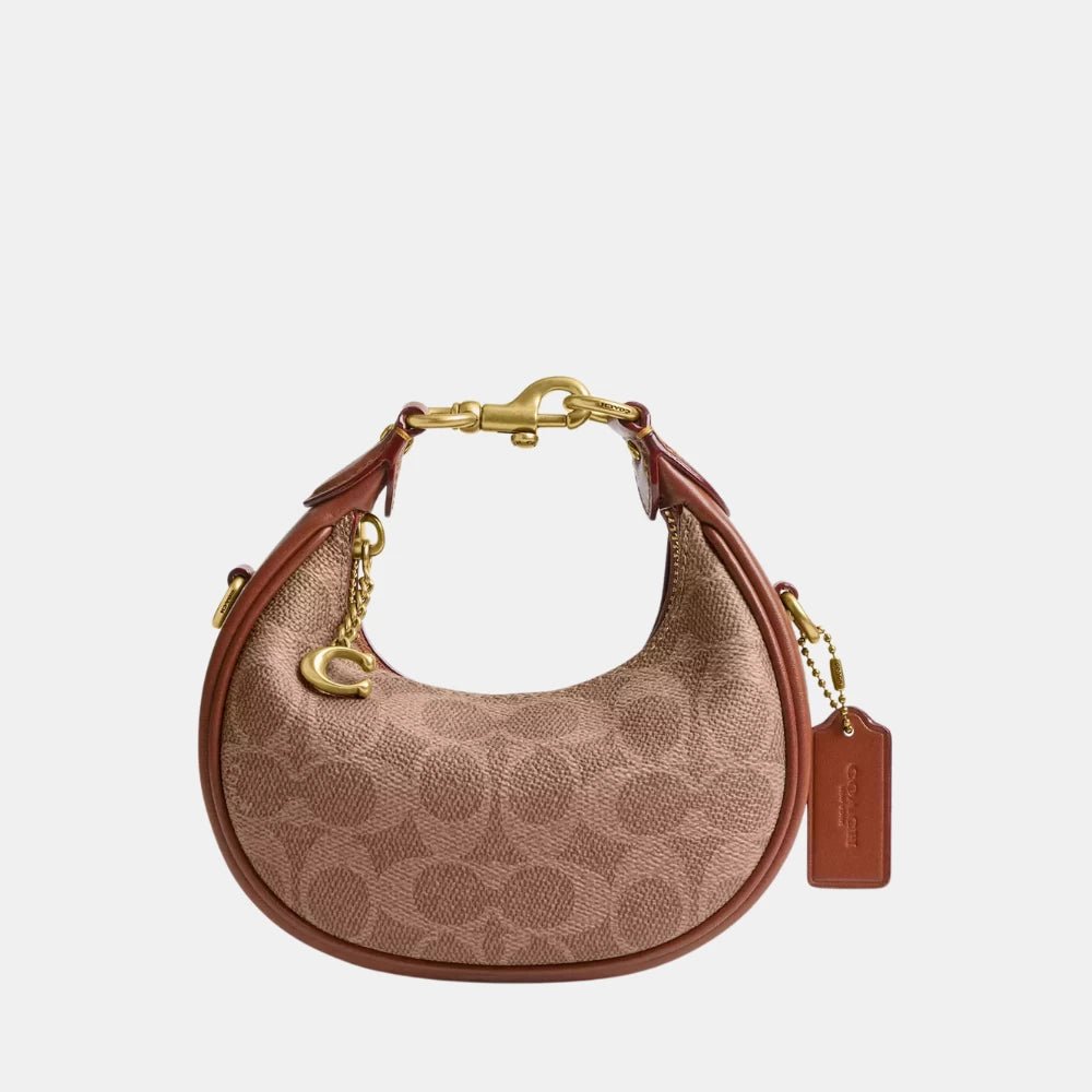 Coach Jonie Mini Leather Bag In Signature Canvas - DIVA ONLINE STORE